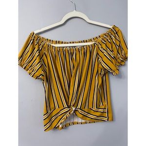 Mustard yellow of shoulder top.